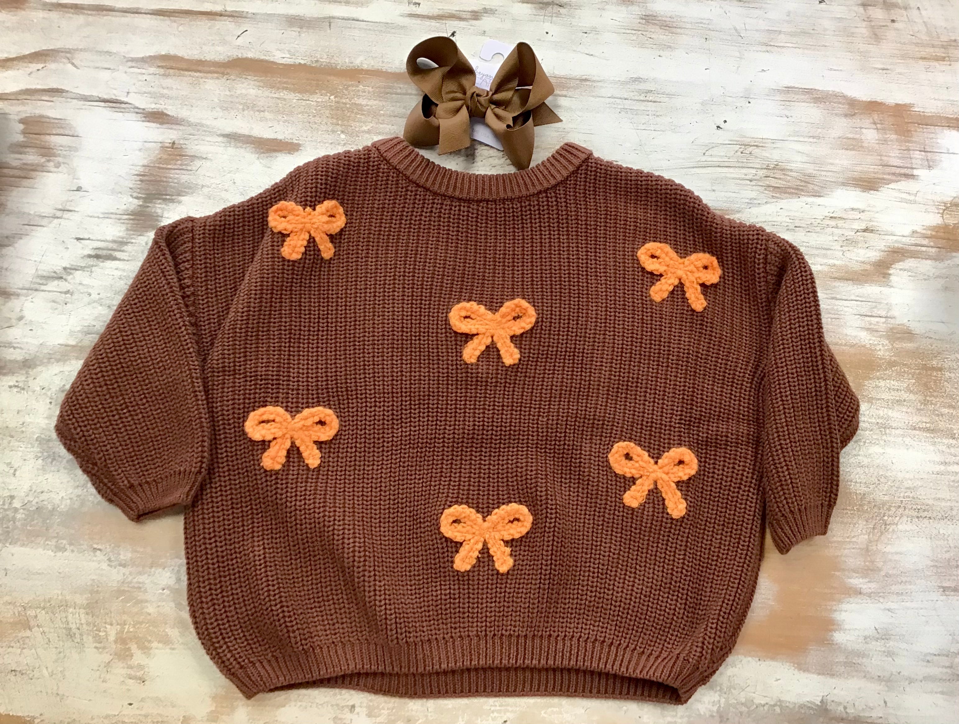 Brown bow sweater
